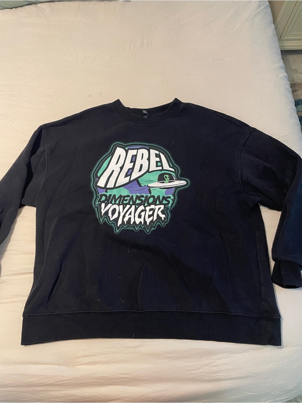 Divided Black Crewneck Sweatshirt with Green and Purple Voyager Graphic